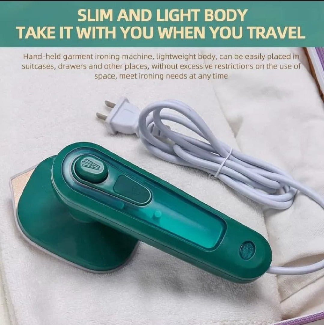 Handheld micro steam iron smoothing wrinkles on a shirt
