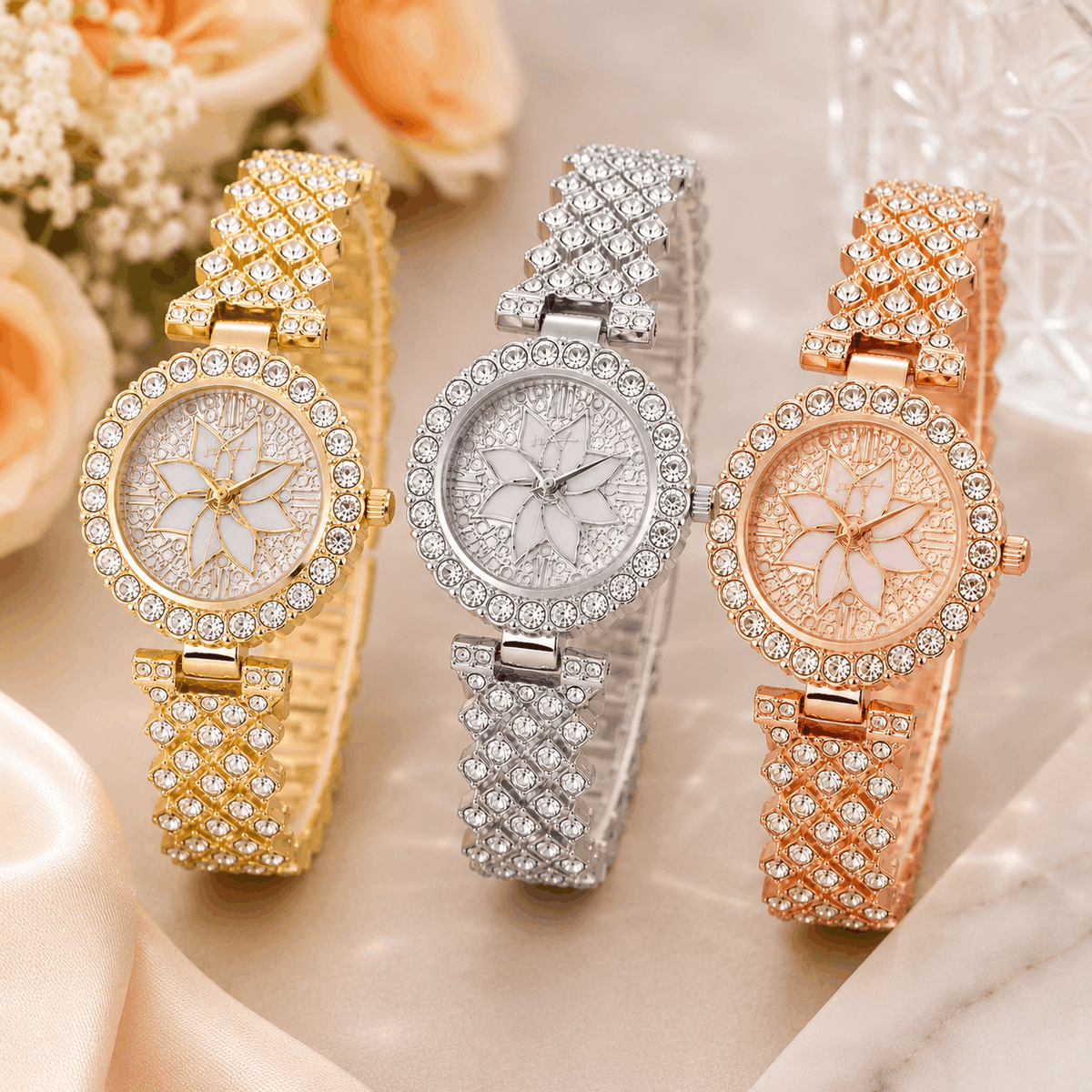 Gold wrist watch with floral dial and sparkling rhinestone bracelet