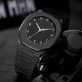 Black minimalist analog watch with stainless steel strap and butterfly lock on a round dial