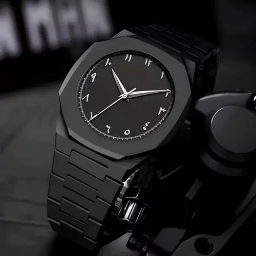 Black minimalist analog watch with stainless steel strap and butterfly lock on a round dial