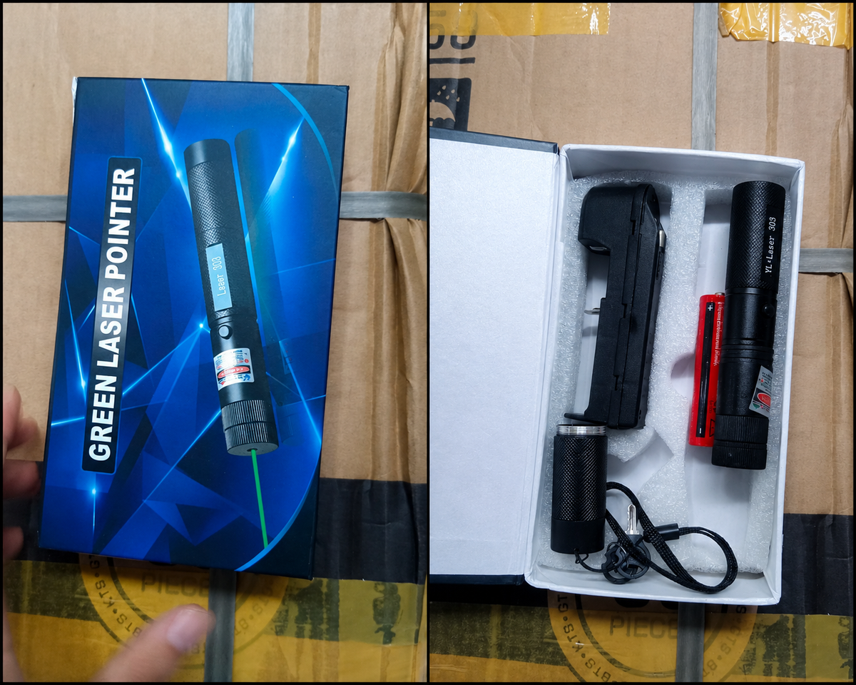 Close-up of the safety lock keys on the green laser pointer.