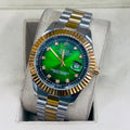 Classic steel wrist watch featuring a polished stainless steel band and green dial.